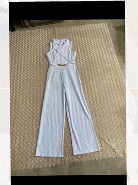 New Women Medium high-neck draped jumpsuit in white featuring a gold belt